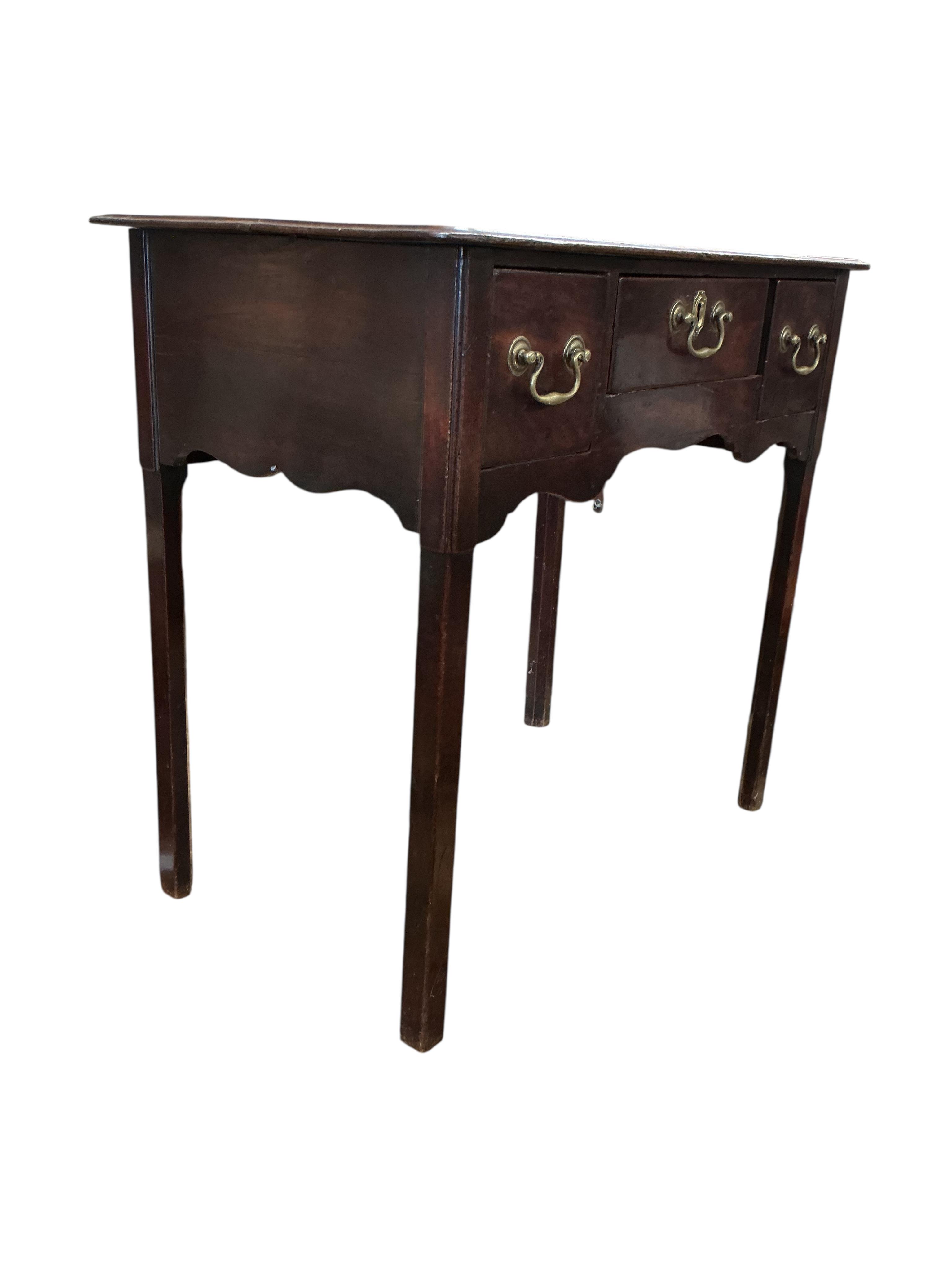 A George III mahogany lowboy, width 80cm, depth 44cm, height 74cm